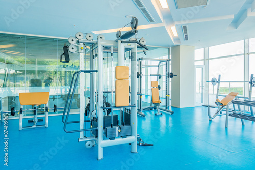 Modern gym with various sports equipment