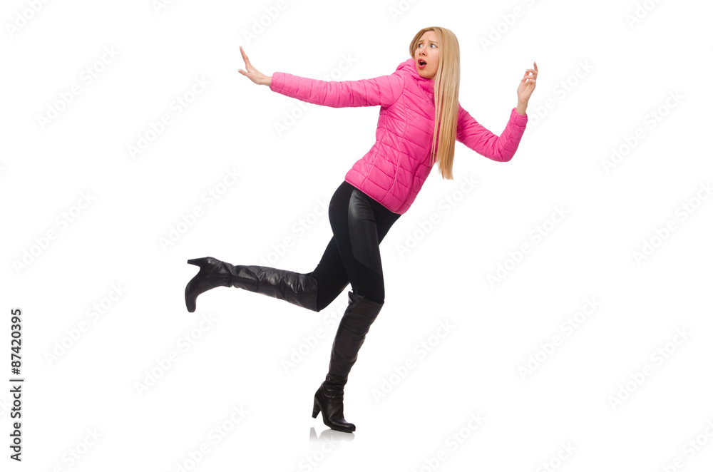 Obraz premium Pretty girl in winter pink jacket isolated on white