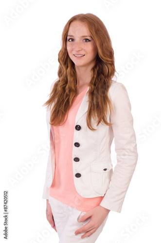 Cute smiling girl in light short coat isolated on white © Elnur