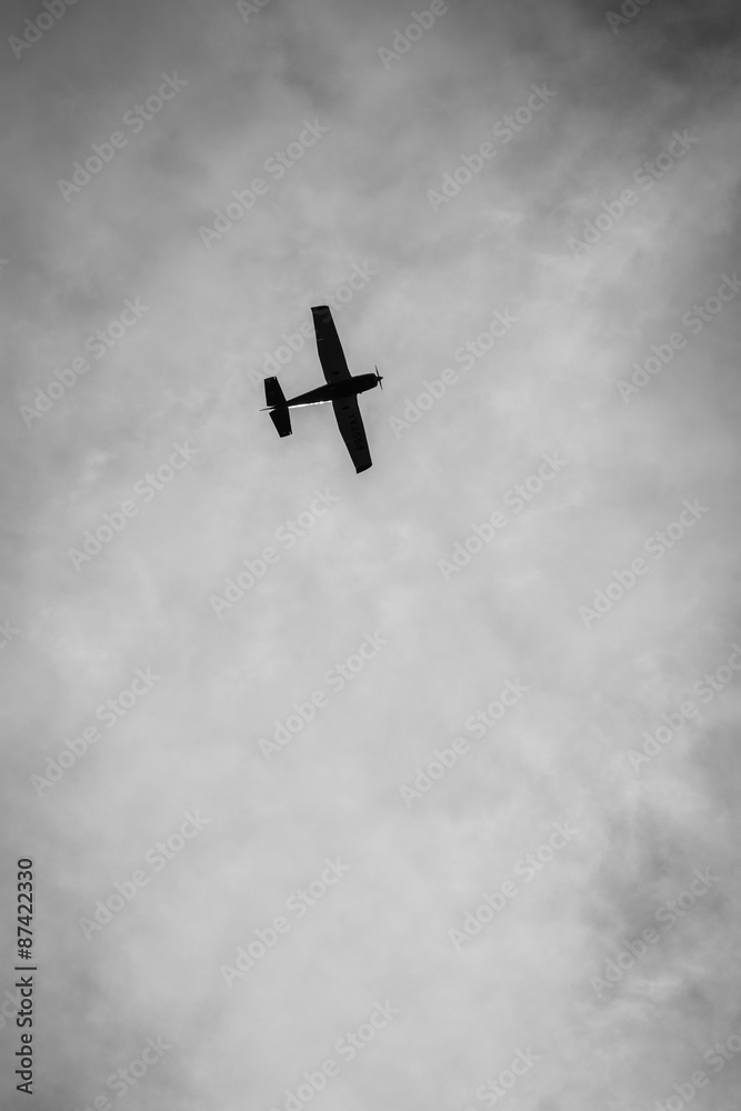 Silhouette of a plane in the sky, black and white Stock Photo | Adobe Stock