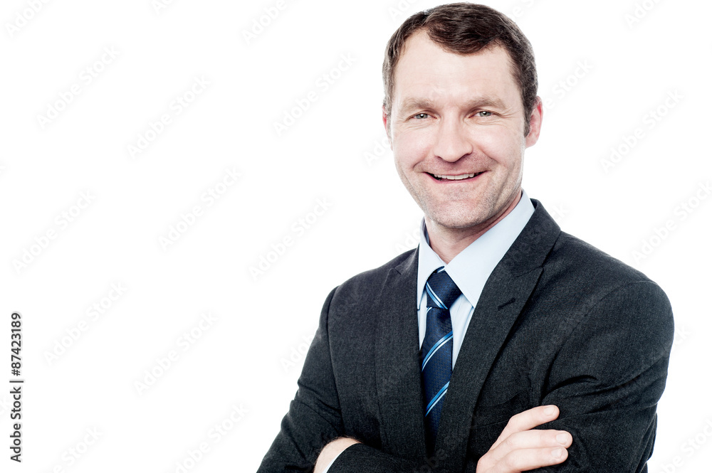 Smiling businessman posing over white Smiling businessman posing over white