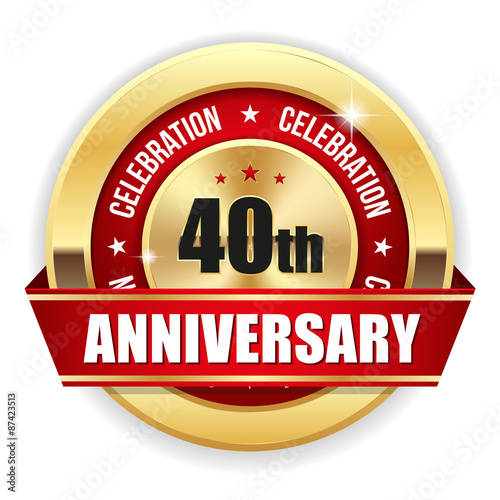 Red 40th anniversary badge with gold border and ribbon
