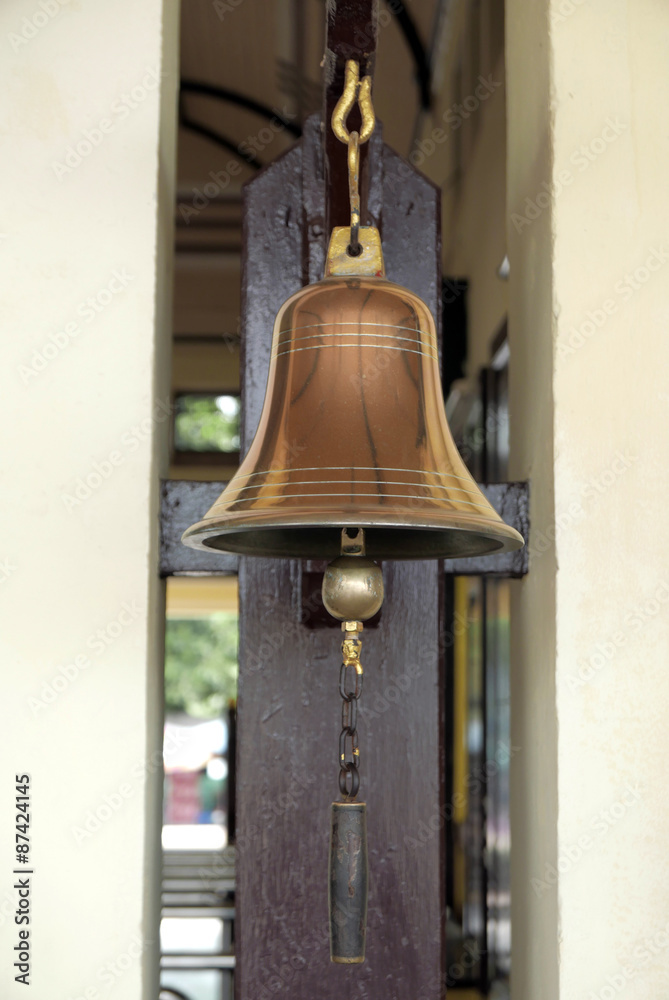 Obraz premium Bell at Train station, golden bell
