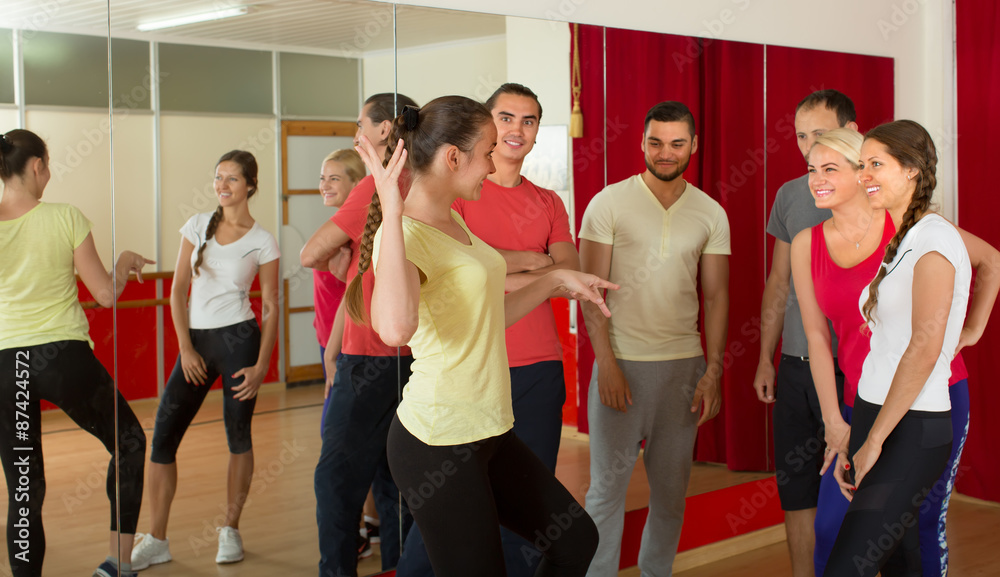 Young adults dancing in a studio
