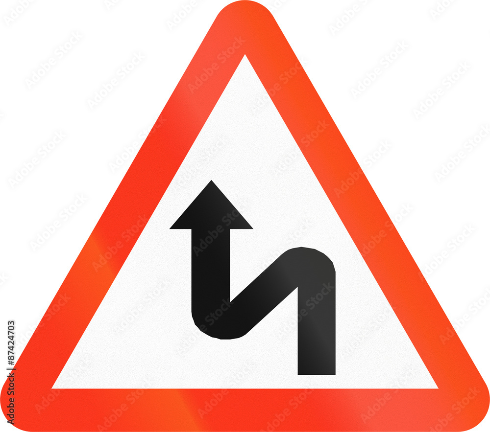 Bangladeshi sign warning about a double curve first to left Bangladeshi sign warning about a double curve first to left
