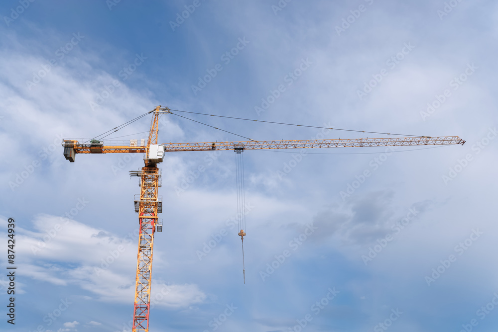Construction of the new building. Construction cranes Construction of the new building. Construction cranes