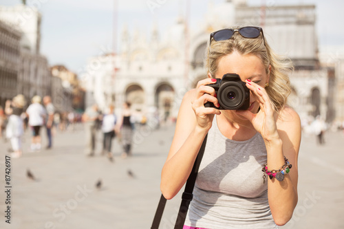 Tourist taking photos in Venice