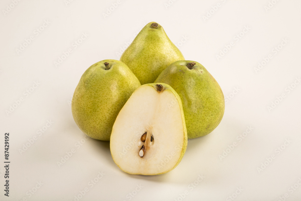 Some pears in a basket over a wooden surface seen from above Some pears in a basket over a wooden surface seen from above