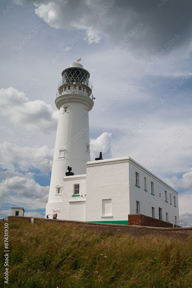 White lighthouse on Flamborough Head in England.