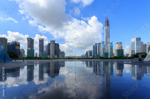 Modern skyline and buildings with empty square floor