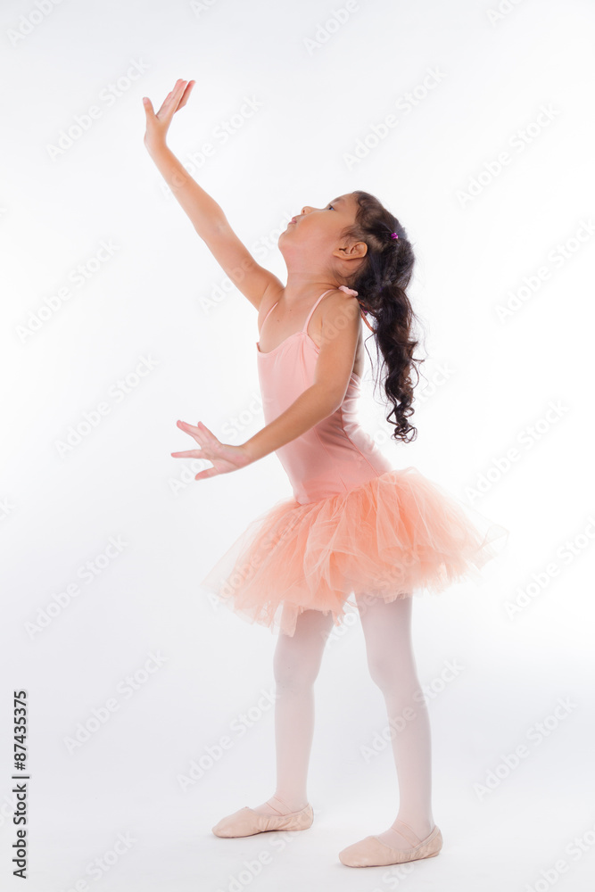 A little ballerina in the studio. On White Background A little ballerina in the studio. On White Background