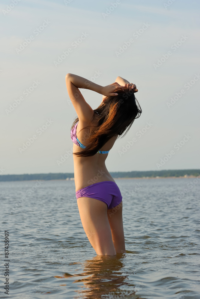 Naklejka premium Asian girl in bikini