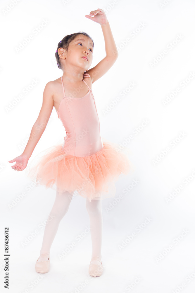 Naklejka premium A little ballerina in the studio. On White Background