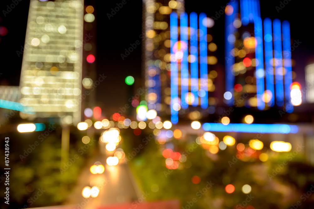 Defocused Illuminated modern city and buildings Defocused Illuminated modern city and buildings