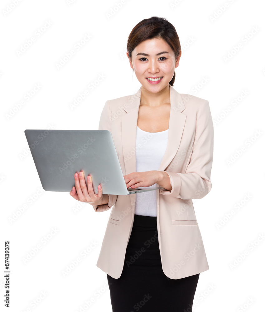 Asian buisnesswoman use of the notebook computer Asian buisnesswoman use of the notebook computer