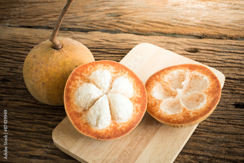 sentul fruit on wood board photo