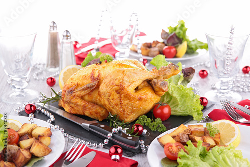 decorated table with roasted chicken