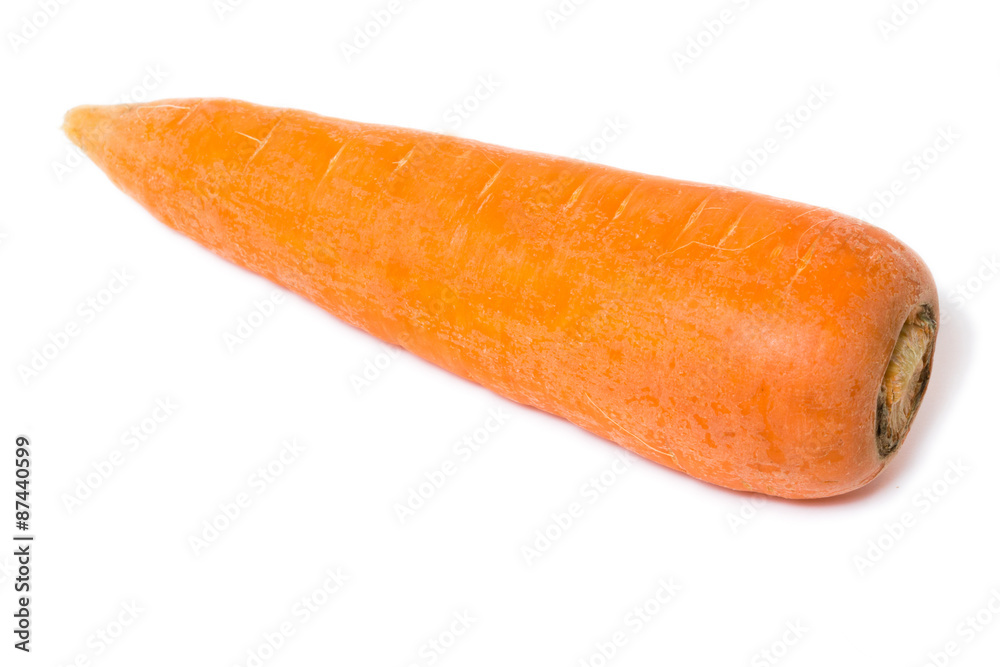 Fresh carrot on an isolated white background. Fresh carrot on an isolated white background.