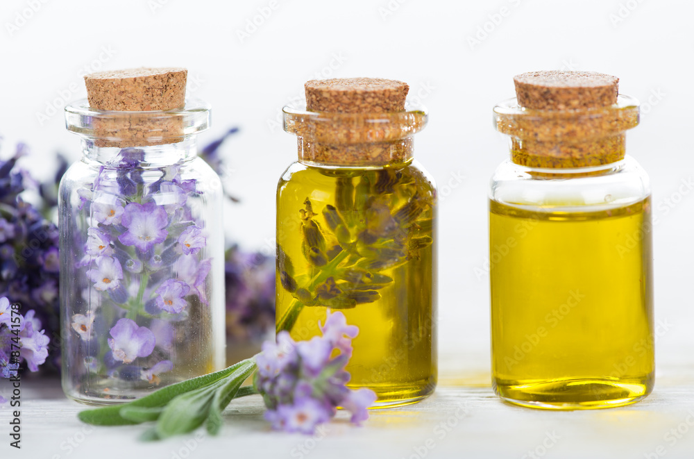 Wellness treatments with lavender flowers on wooden table. Spa still-life. Wellness treatments with lavender flowers on wooden table. Spa still-life.