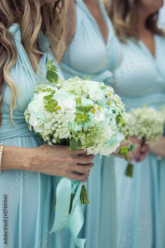 Bridesmaids holding flowers