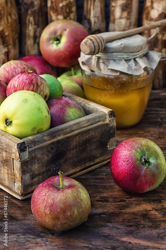 harvest of ripe apples and honey to the Church celebration of the apple feast day