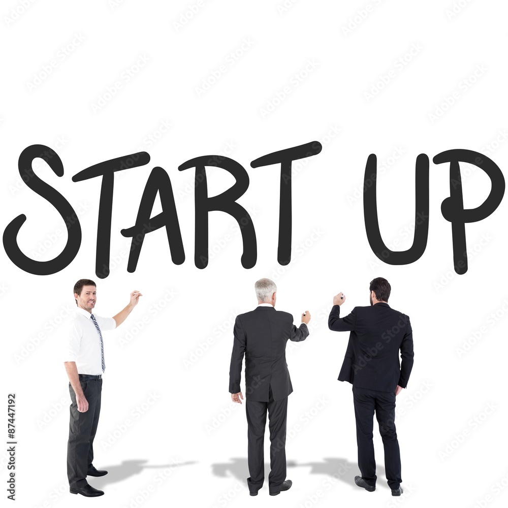 Composite image of business team writing Composite image of business team writing