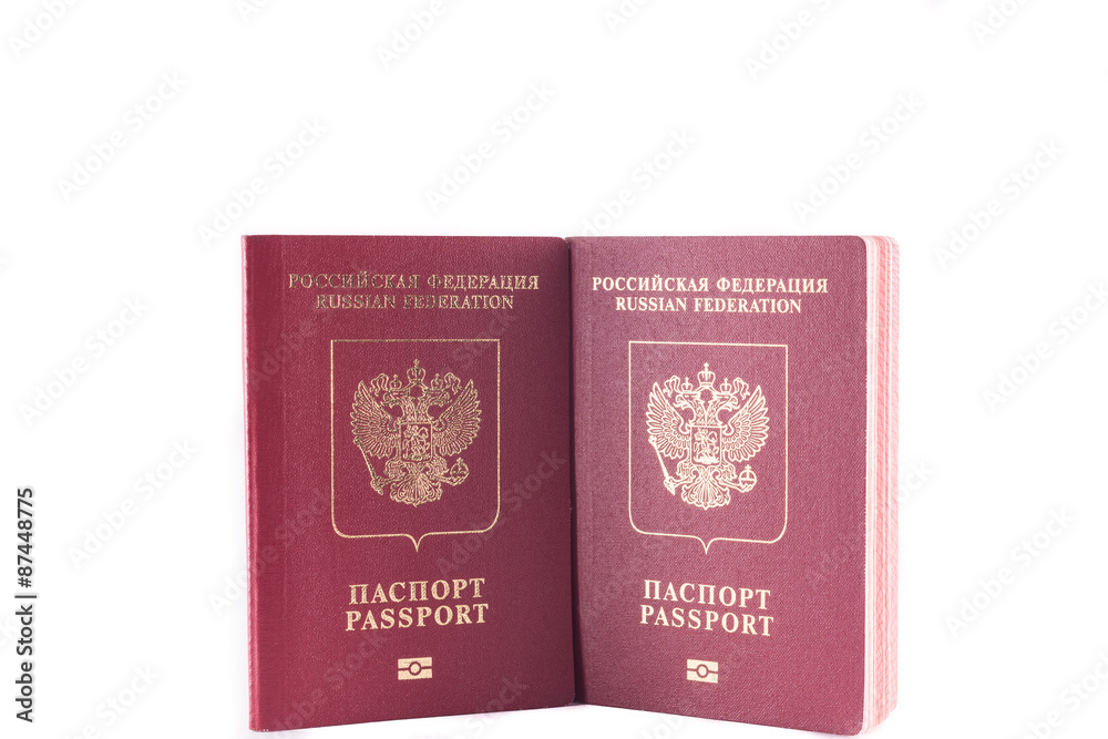 Two passports red colour with a Golden eagle emblem Two passports red colour with a Golden eagle emblem