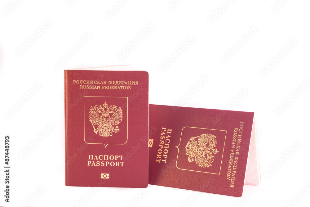 Two passports red colour with a Golden eagle emblem Two passports red colour with a Golden eagle emblem