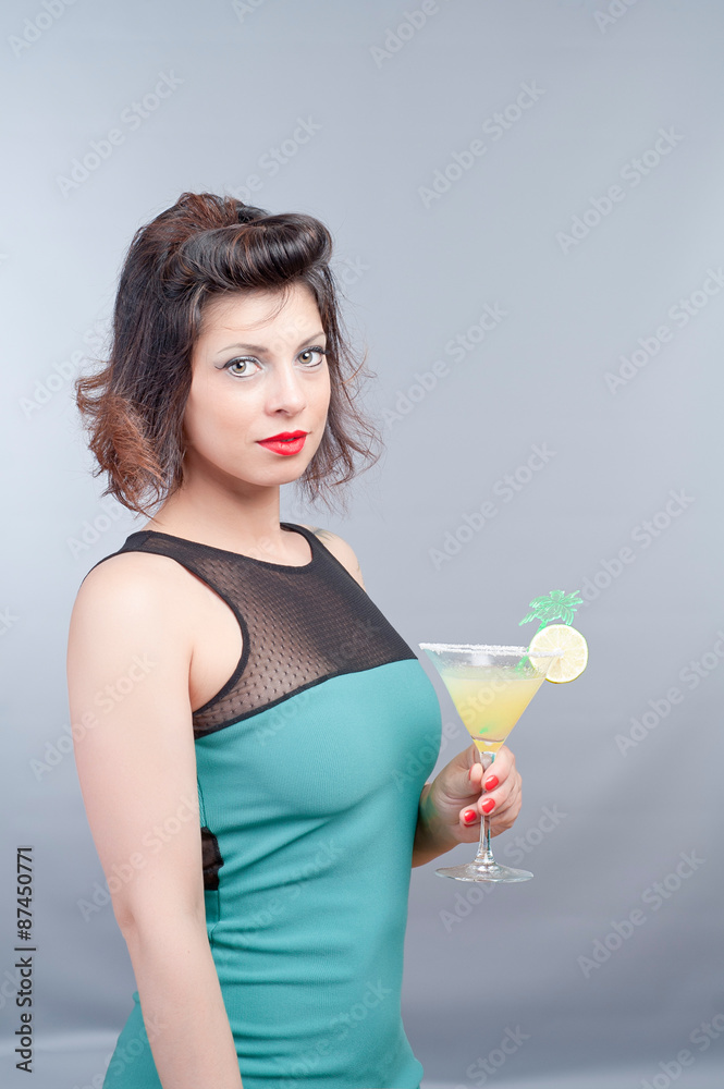 pretty brunette young girl taking a fruit cocktail pretty brunette young girl taking a fruit cocktail