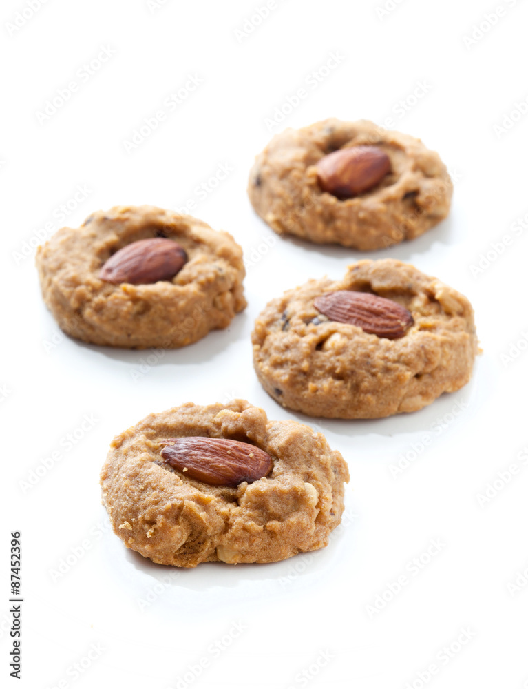 Homemade almond cookies on white background