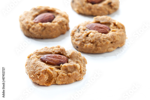 Homemade almond cookies on white background