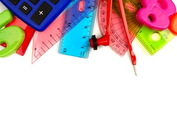 Border of school supplies with math theme on a white background