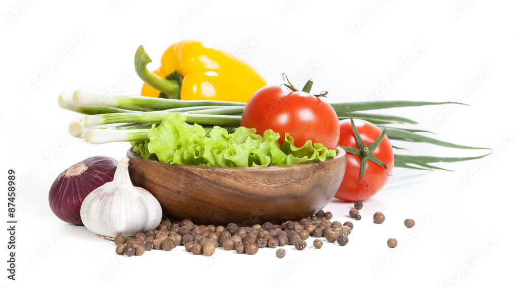 Vegetable isolated on a white background. Vegetables and spices isolated on white background. Vegetables on the plate on a white background. Harvest vegetables. Vegetables in a wooden plate. Vegetable isolated on a white background. Vegetables and spices isolated on white background. Vegetables on the plate on a white background. Harvest vegetables. Vegetables in a wooden plate.