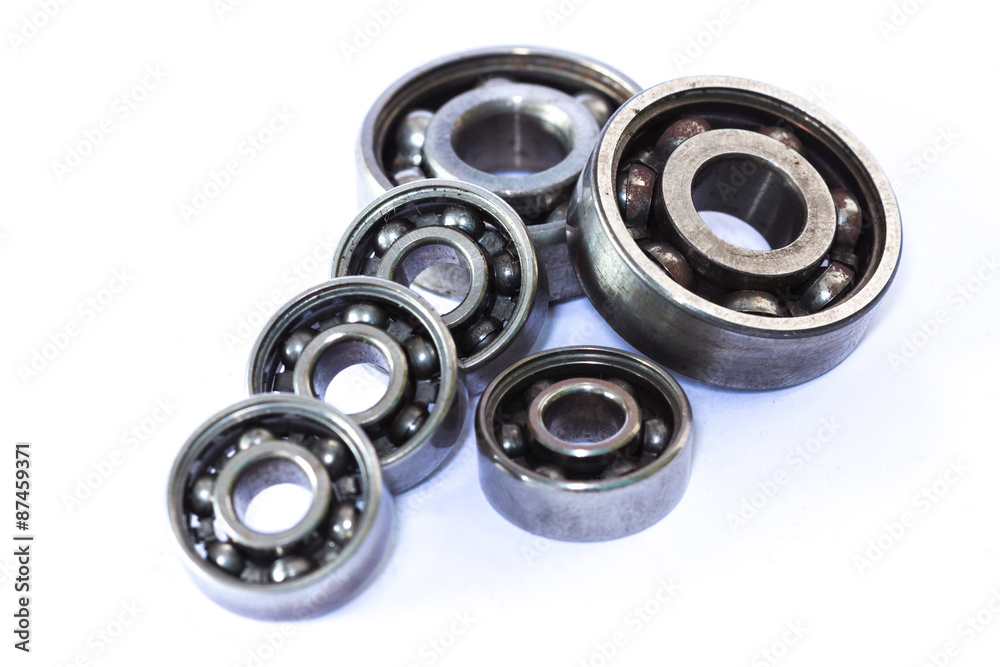 Old and dirty ball bearing, isolated on white background Old and dirty ball bearing, isolated on white background