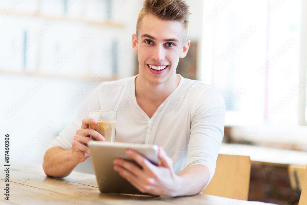 Young man using digital tablet
Young man using digital tablet