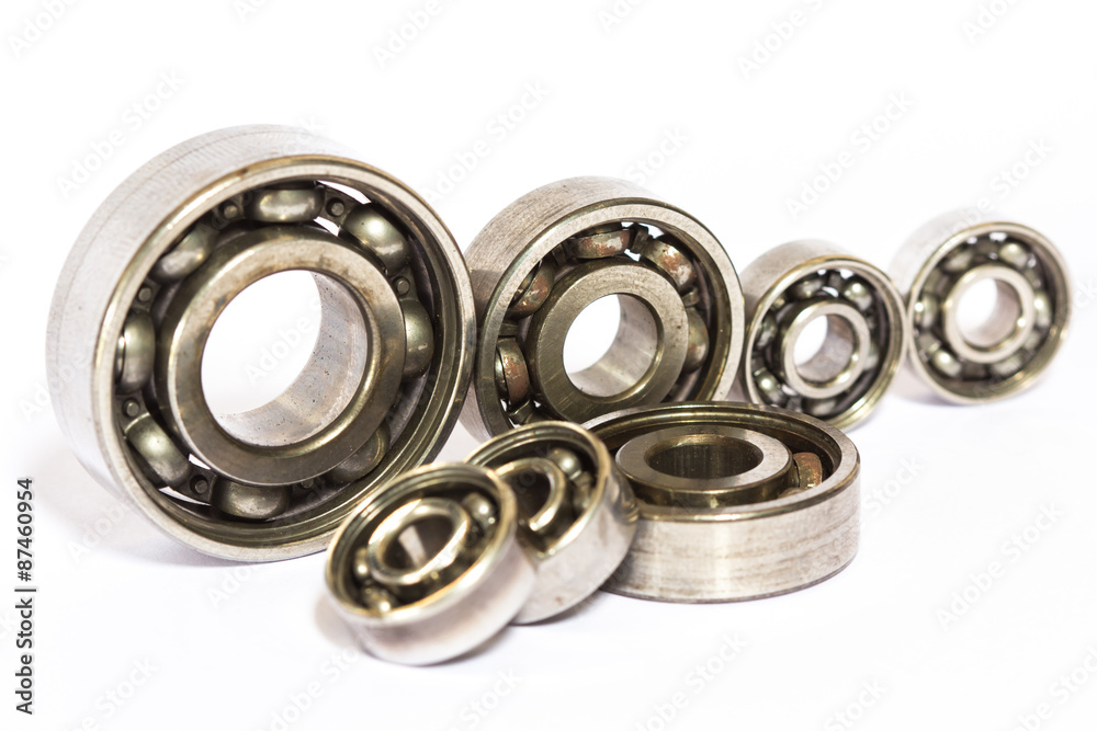 Old and dirty ball bearing, isolated on white background Old and dirty ball bearing, isolated on white background