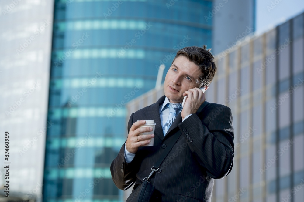 businessman talking on mobile phone outdoors financial district businessman talking on mobile phone outdoors financial district