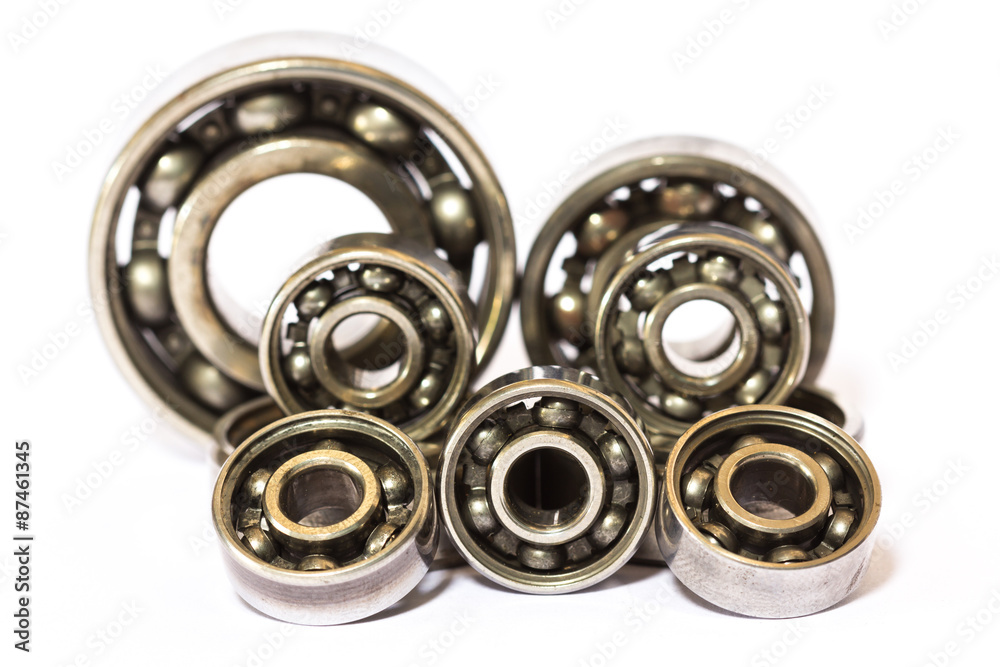 Old and dirty ball bearing, isolated on white background Old and dirty ball bearing, isolated on white background