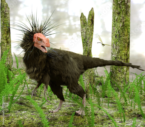 The dinosaur Ornitholestes pauses to watch a dragonfly while moving through a swampy forested area in this late Jurassic scene (154 million years ago). photo
