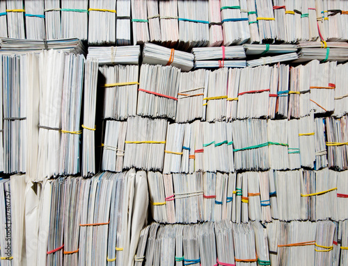 Stack of the old paper documents in the archive.