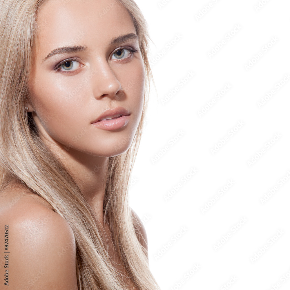Naklejka premium Beautiful Blond Girl. Healthy Long Hair. White Background
