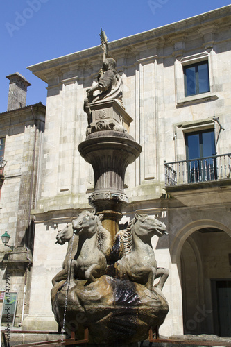 Dos Cavalos fountain in the Praza das Praterias.Santiago de Compostela, Spain.. photo