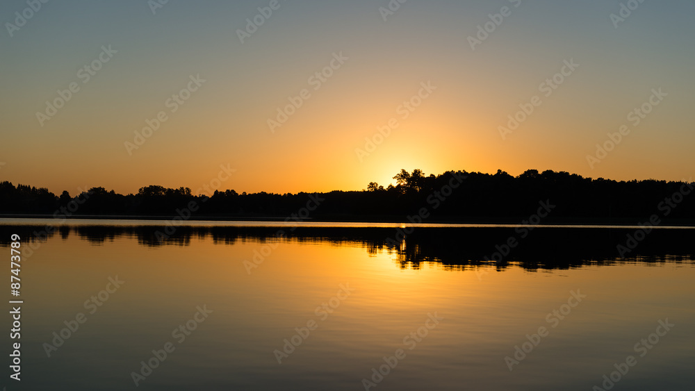 symmetric reflections on calm lake