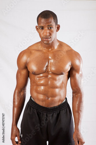 Strong black man with his shirt off © Allen Penton