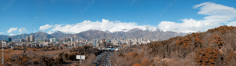 Panorama of Tehran Skyline with Alborz Mountains and Jungles Surrounding the Buildings