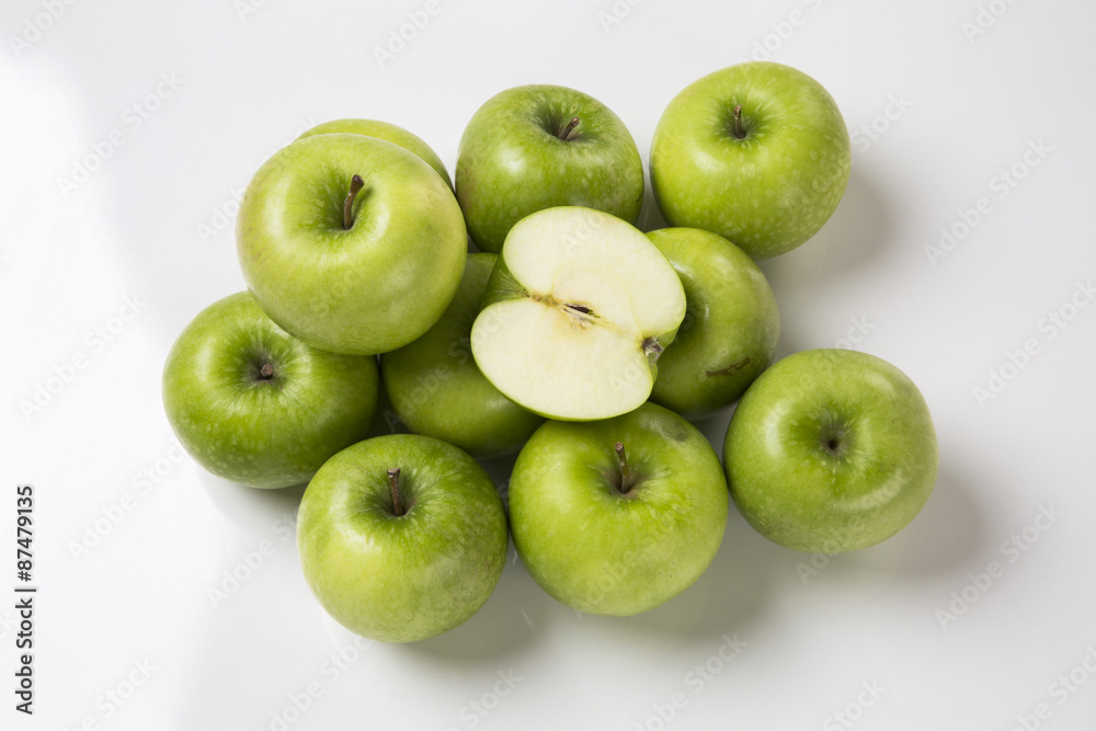 Some green apples on a white background Some green apples on a white background