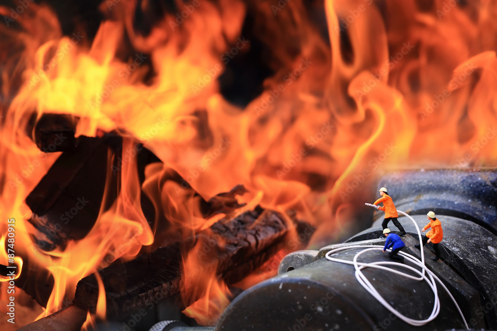 Obraz premium Group of Fireman (miniature)working.