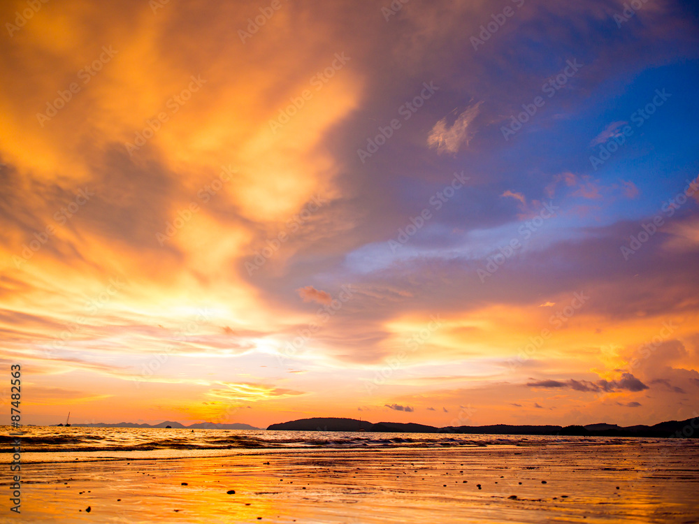 Tropical sunset on the beach. Ao-Nang. Krabi.. Tropical sunset on the beach. Ao-Nang. Krabi..