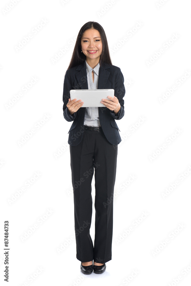 full length business woman smiling using touch pad tablet pc iso full length business woman smiling using touch pad tablet pc iso