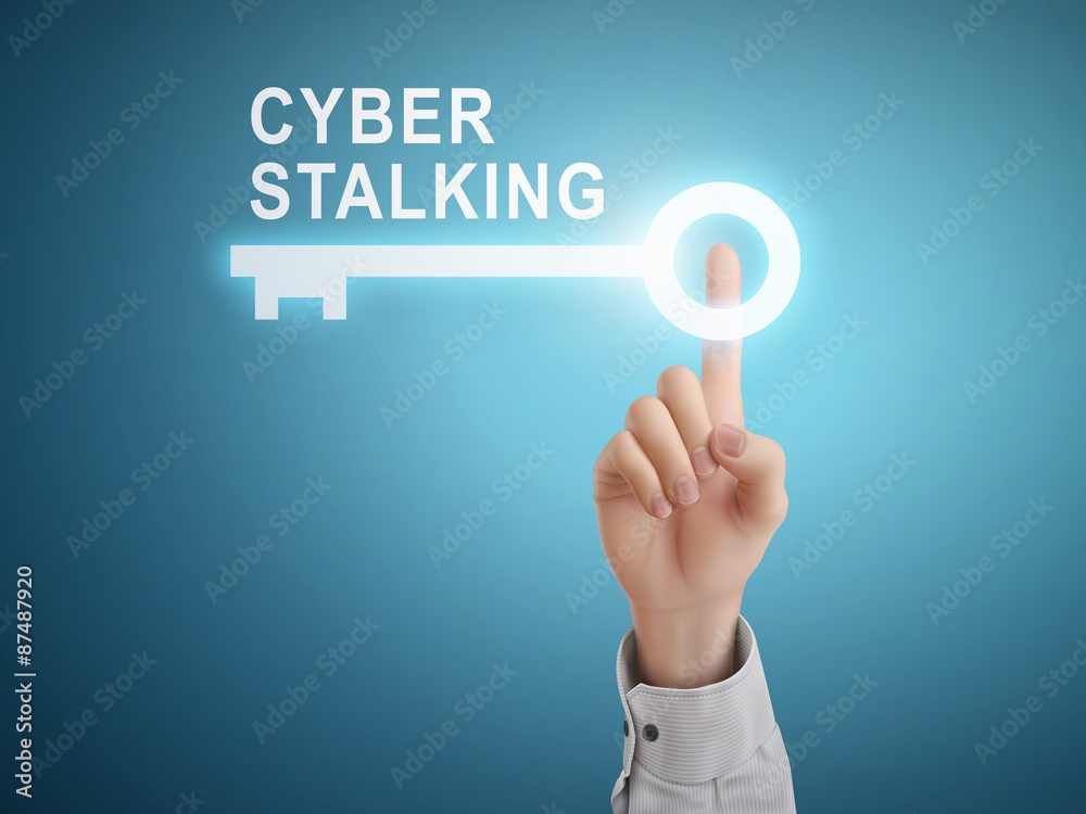 male hand pressing cyber stalking key button male hand pressing cyber stalking key button